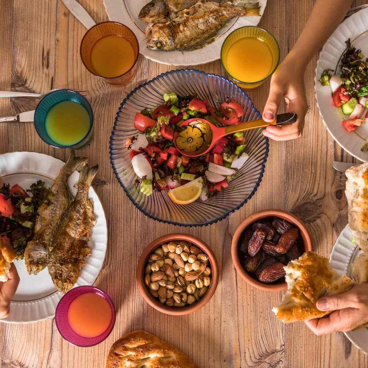 Omega-3-rich foods, leafy greens, fruits, and vegetables arranged as part of a healthy diet for lung health.